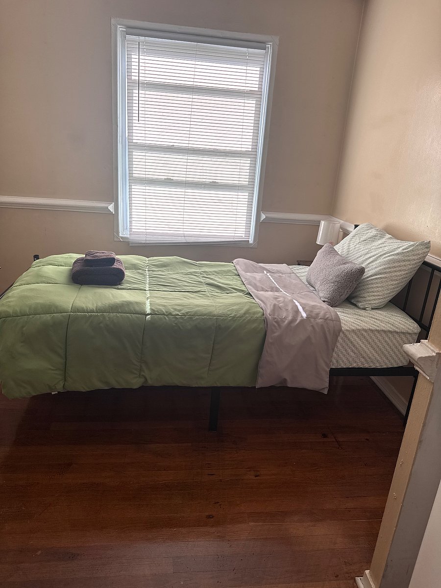 Bedroom A - Twin bed, shared bath, closet, ceiling fan 