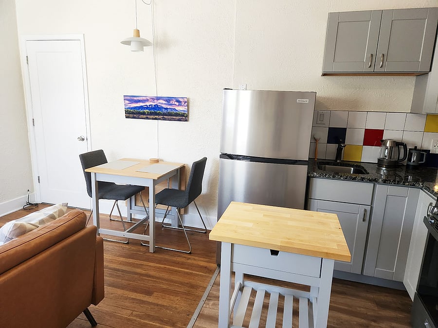 The open floor plan living, dining kitchen area.
