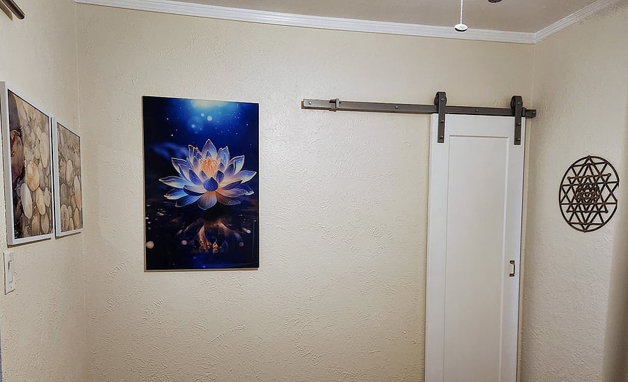 This is the artwork in the bedroom you will wake up to. Pieces have been carefully selected ffrom all over the world for their peaceful and uplifting quality, but also for being neutral.