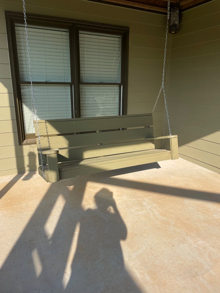 Porch Swing! Great for relaxing after a hard days work.