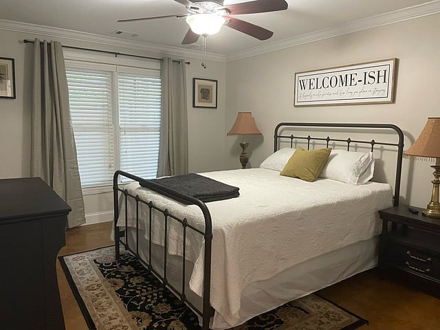 Bedroom with open curtains.