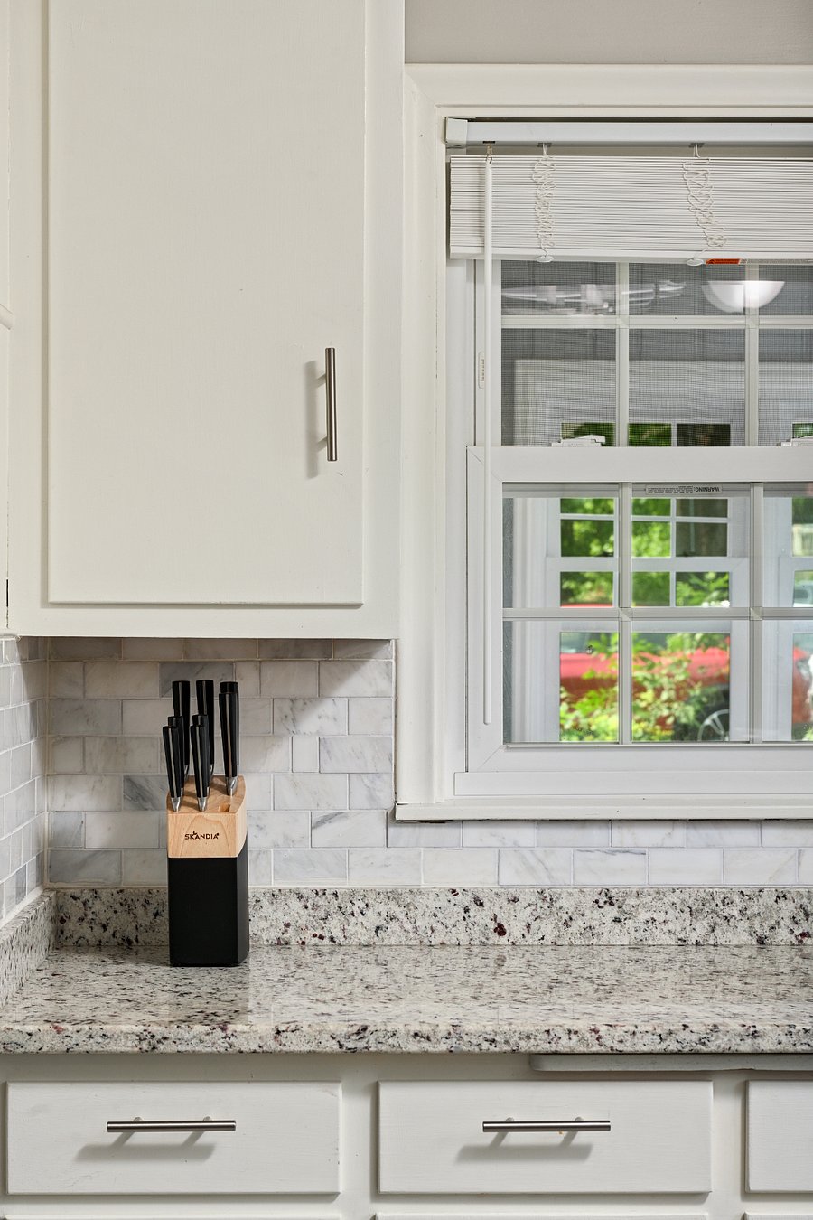 Kitchen - view into breezeway (3-season porch)