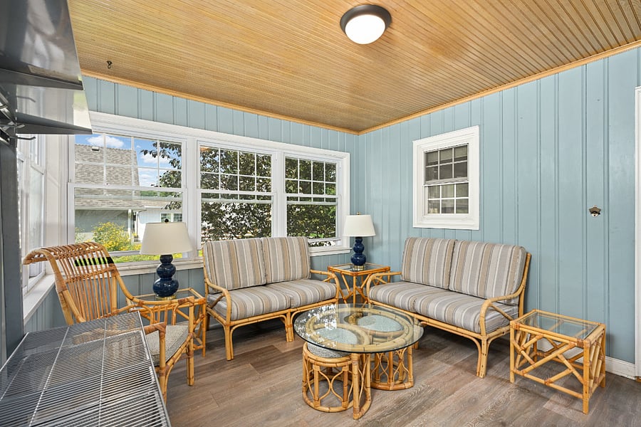 Main floor breezeway (3-season porch) connects house to garage