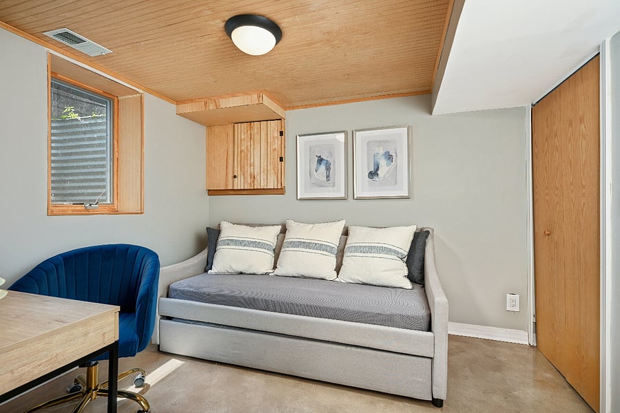 Lower-level bedroom or office, twin bed with second twin trundle bed underneath