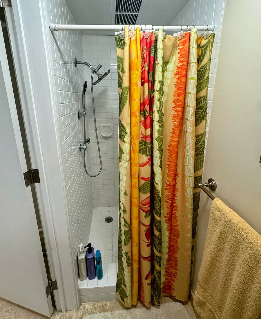 Enjoy the invigorating rainfall shower heads in both bathrooms with a stall shower in the primary suite bathroom and full tub/shower in the second bathroom.  