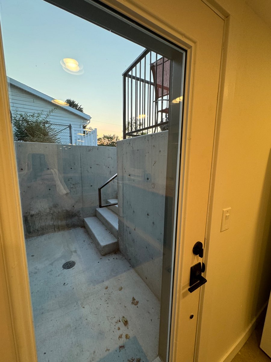 Looking out Kitchen to entrance