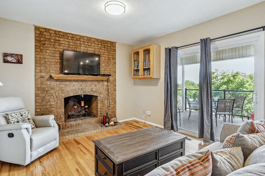 Enjoy morning coffee on the deck from this living area. Or sip your favorite evening beverage on the deck.
