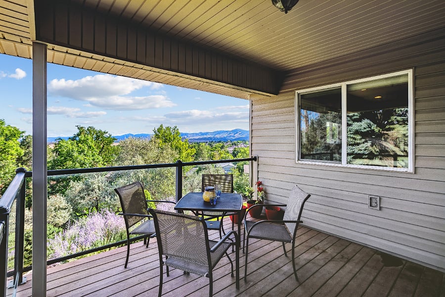 Deck with views. Sunset clouds are pretty from this view. Accessed from main level living area.