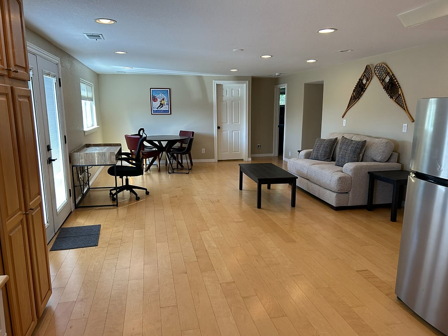 Flex area walkout bsmt. Also has table, chairs, smaller refrigerator and microwave.