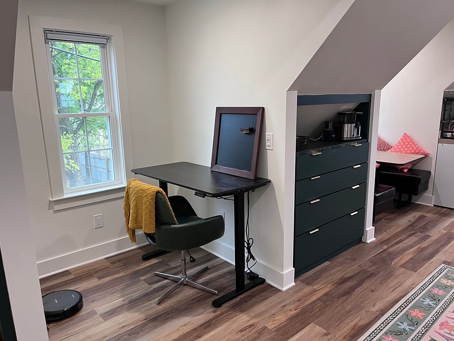 The second dormer has been made into a work from home space and has a working sit-stand desk. 