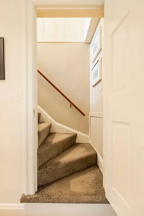 This is the entrance up to the 3rd floor where our guest bedrooms and bathroom suite is. There is a door at the entrance to these stairs for your privacy.