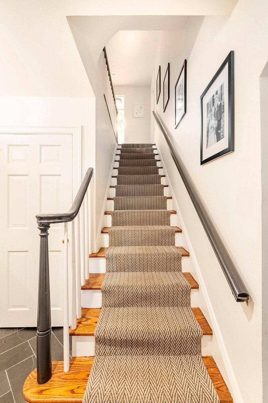These stairs lead from the front door up to the 2nd floor.
