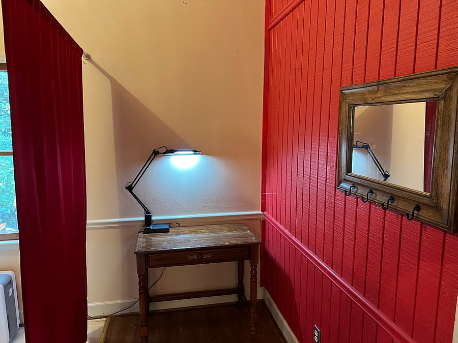 Desk nook near laundry room for additional work space.