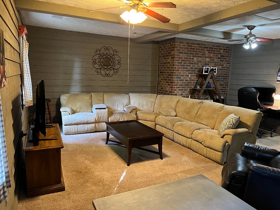 Comfy den with plenty of seating - enjoy!
