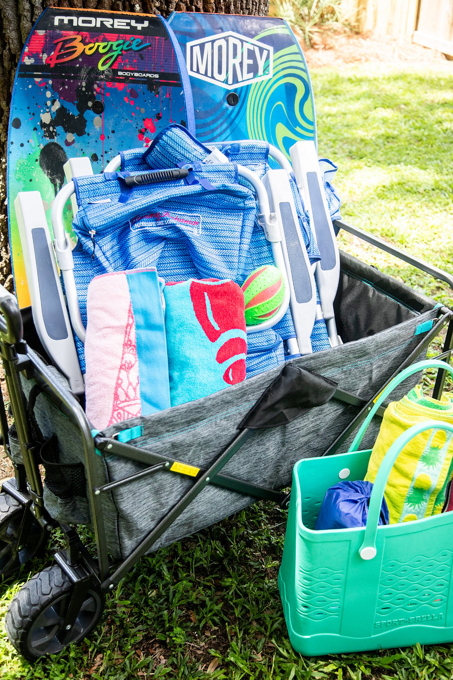 Beach chairs, wagon, boogie boards, sun shade and towels included