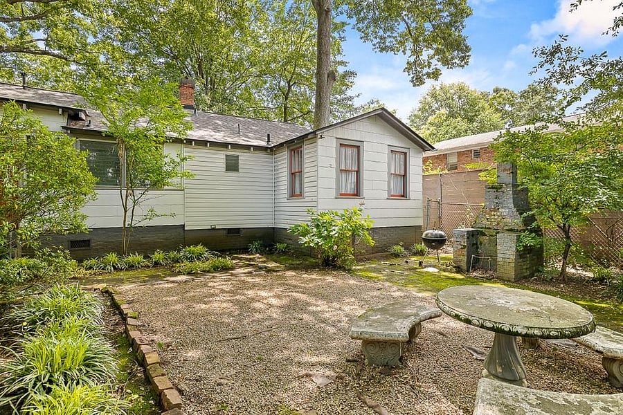 Backyard with outdoor fireplace
