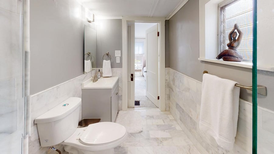 Recently renovated back Master Bathroom with new walk-in shower, where the picture was taken from, new floors, sink, mirror and paint