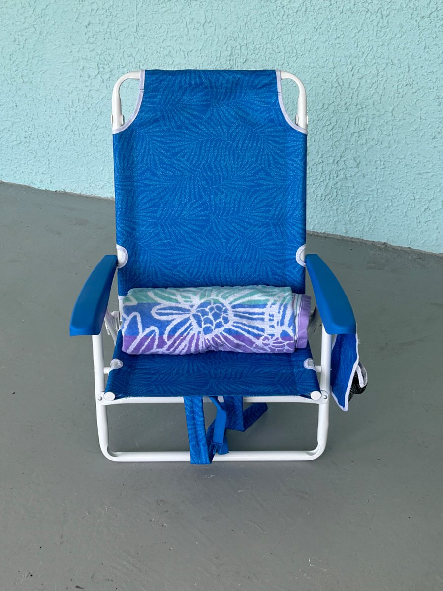 4 beach chairs and towel