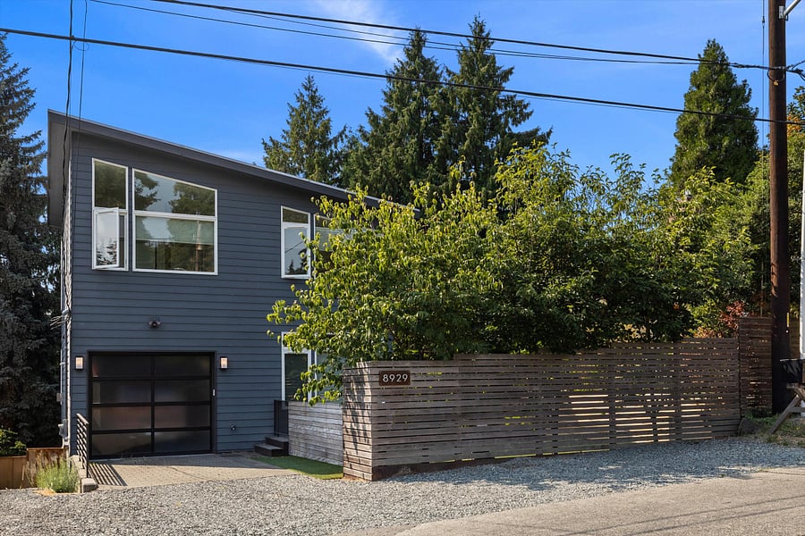 Front of the house. The rental unit is on the ground floor and private entrance is on the LEFT side down the stairs.