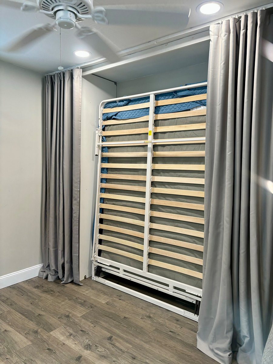 Murphy Bed easily folds down or up to create more space.