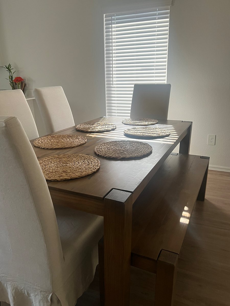 Dining table is part of shared living space.