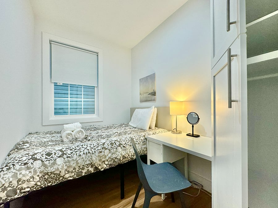 1st floor apartment room B with 1 full bed, desk, wardrobe