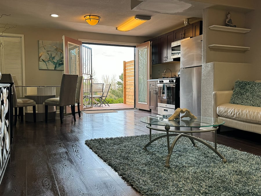 View of Kitchen / entrance from common area.