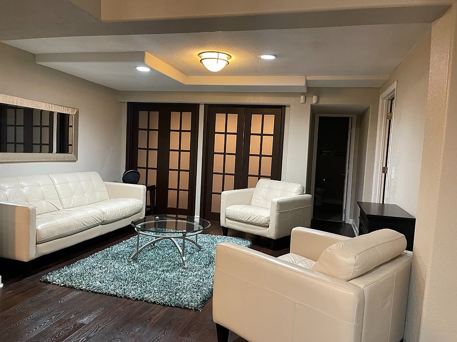 Living room with view of french doors to bdrm #2