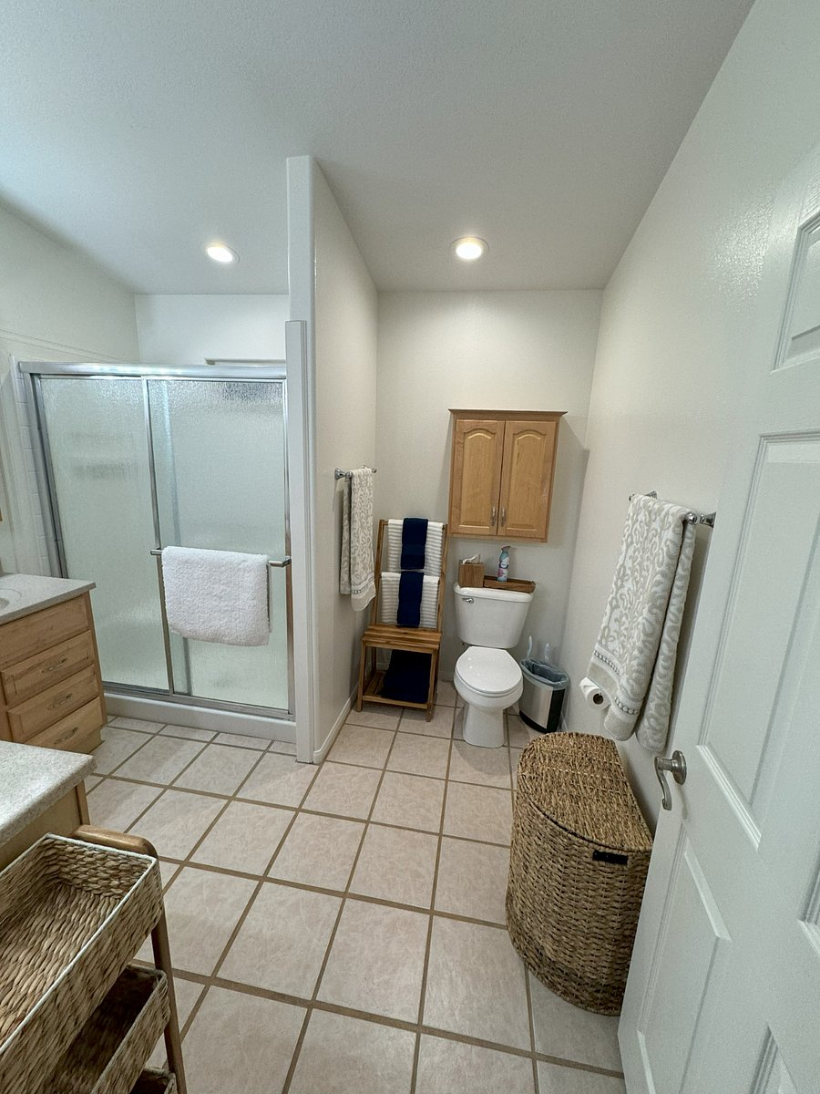 Walk in Shower, Wood Chair/Towel Storage, Above Toilet Cabinet
