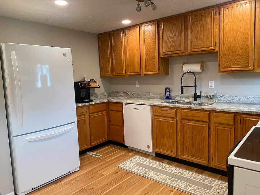 Newly renovated kitchen with quartz counters. Lots of storage and counter space!