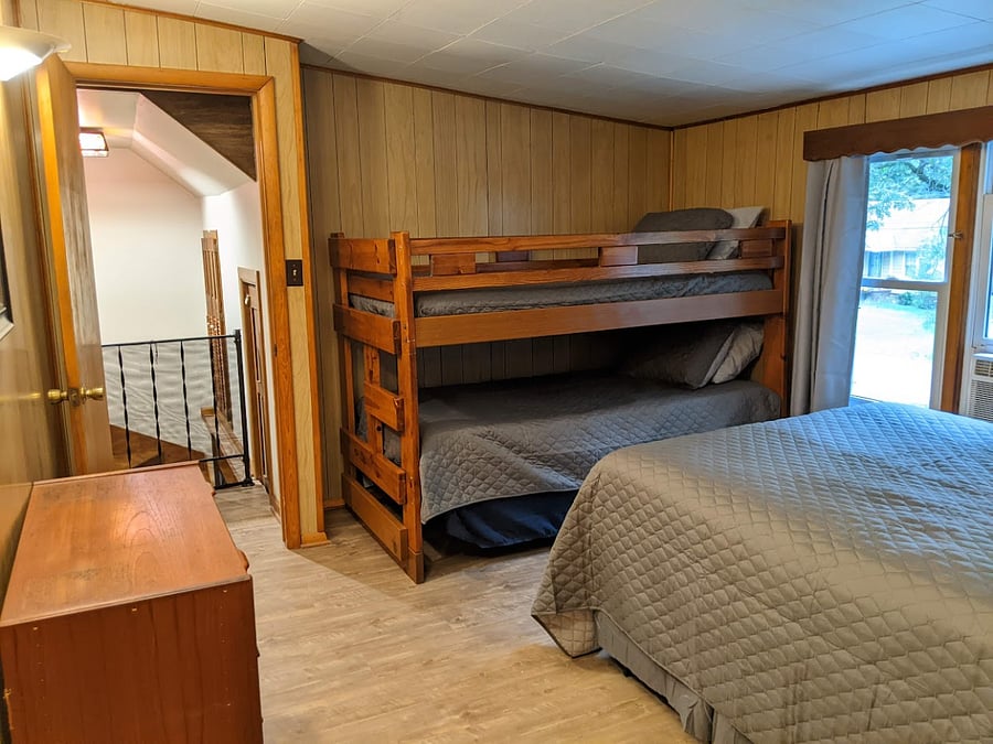 Bedroom #2, Bunk beds and full size bed, and dresser.