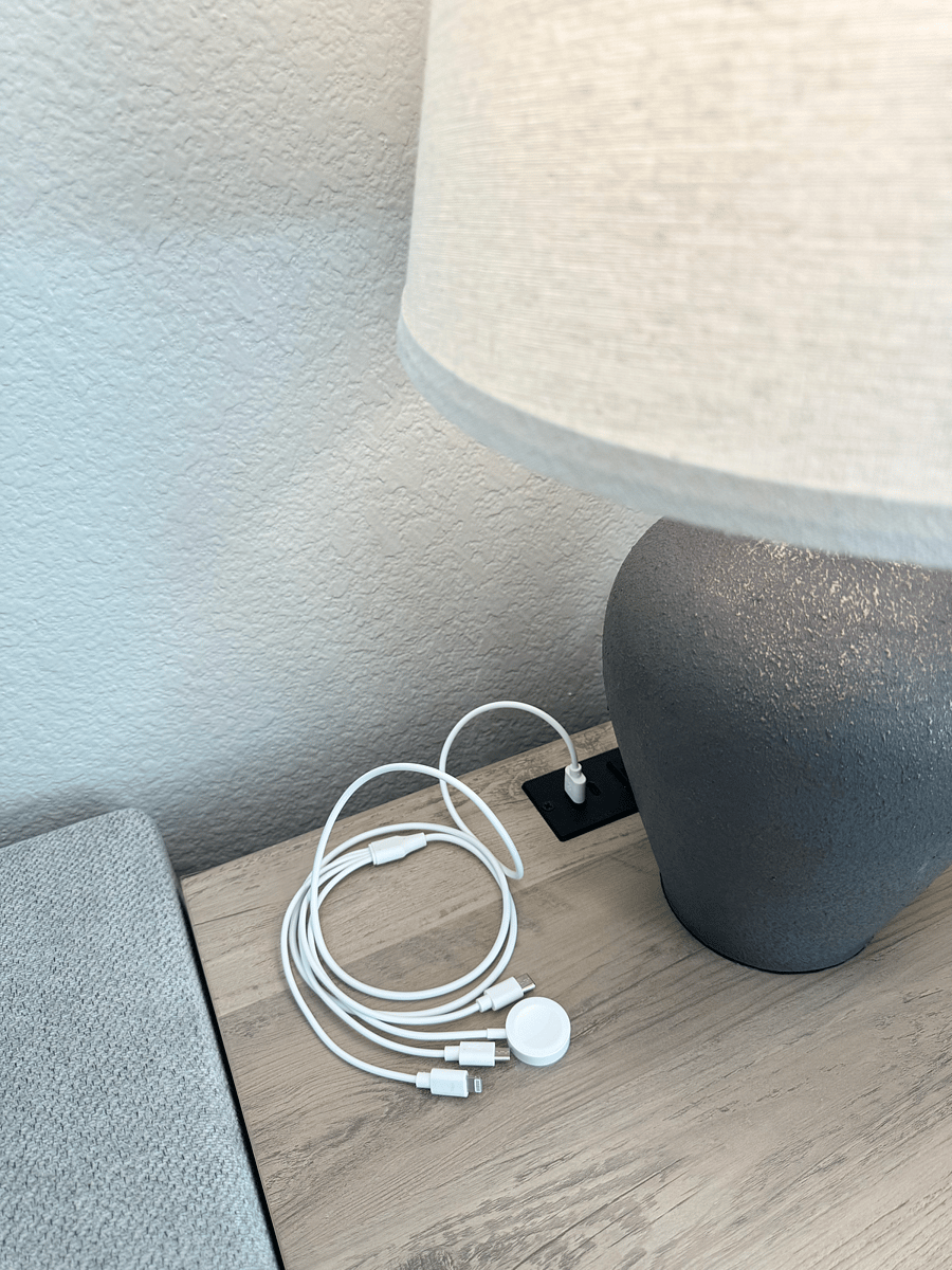 The side tables have built-in charging stations with a USB port  & wireless charging pads. It accommodates iPhones, Samsung phones, iPads, and Apple Watches, keeping all your devices powered up and within reach, blending style with functionality.