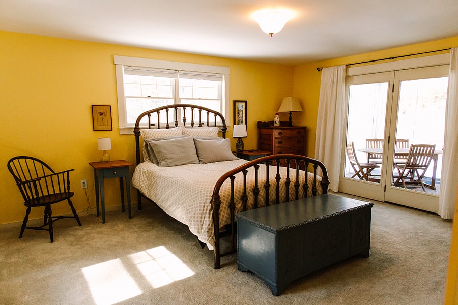 Downstairs bedroom - attaches to screen porch. Two closets