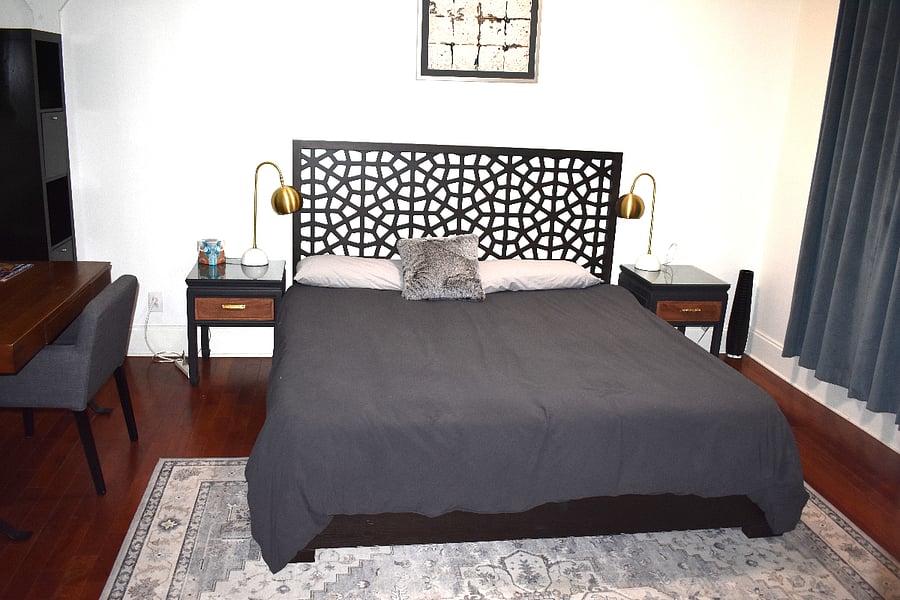 Primary bed with king-sized memory foam mattress.