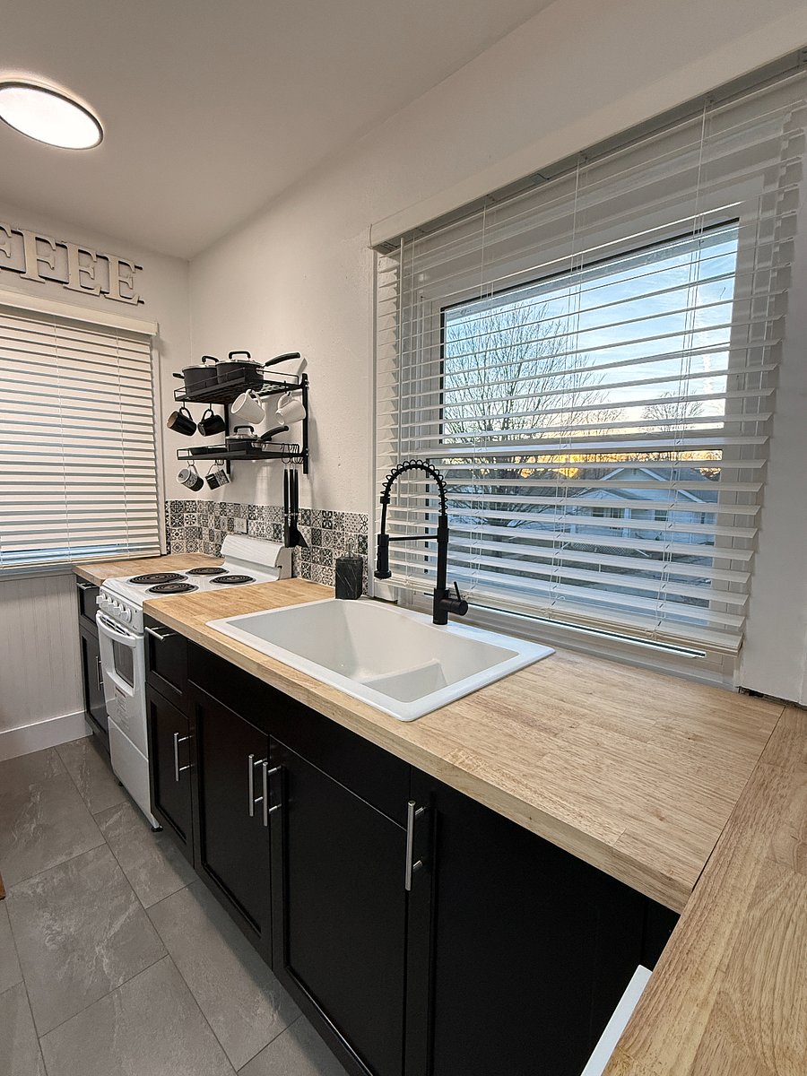 Full size kitchen with many extras for cooking at home.