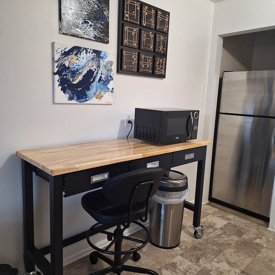 Eat-in kitchen, work area or meal prep surface.