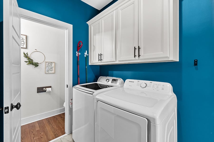 Mudroom with on site washer/dryer and half bathroom