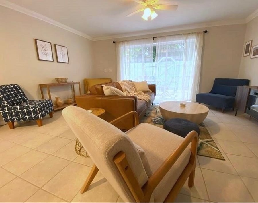 Living room, plenty of seating for entertaining.