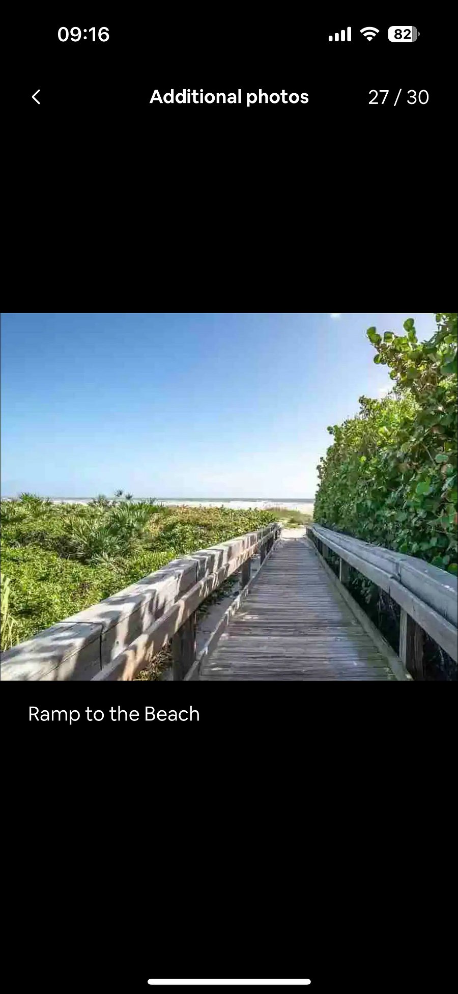 Private beach access (locked gate) with path leading to the beach.