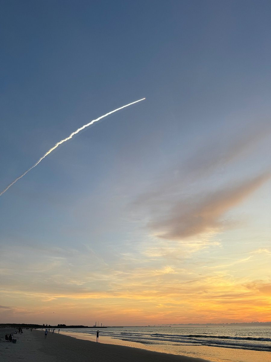 Rocket launch viewed from the beach in front of the community