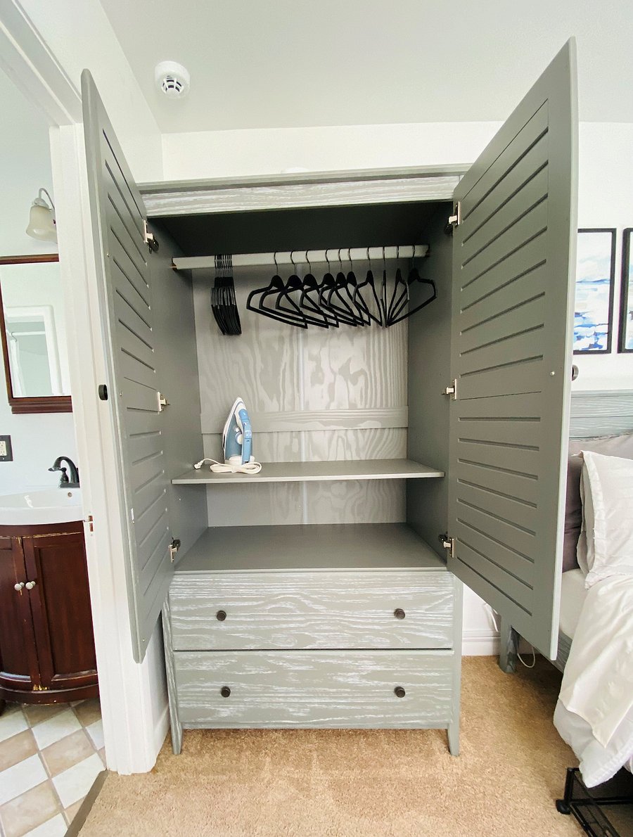 Roomy Armoire closet with two wide drawers. More under bed storage drawers.