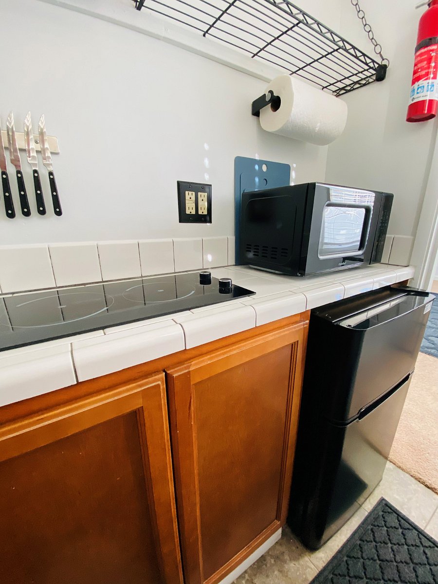 Cooktop, Microwave, and Mini fridge with freezer compartment