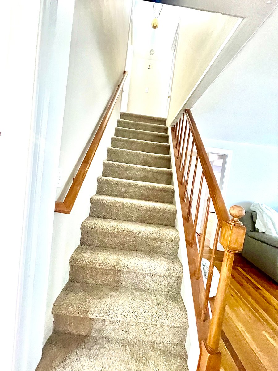 stairs to the other two bedrooms