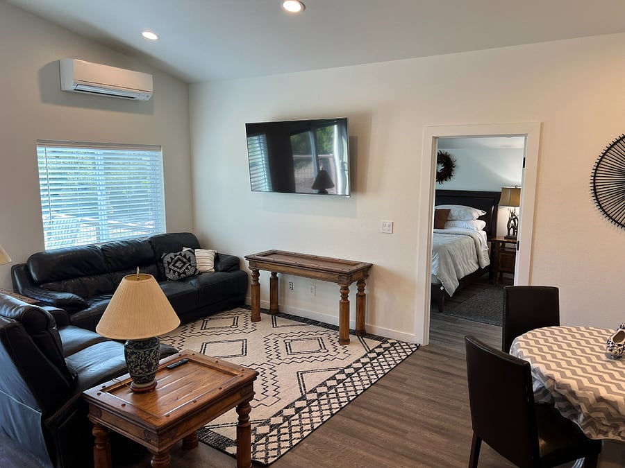 Mini-split unit provides A/C and heat located in wall of unit