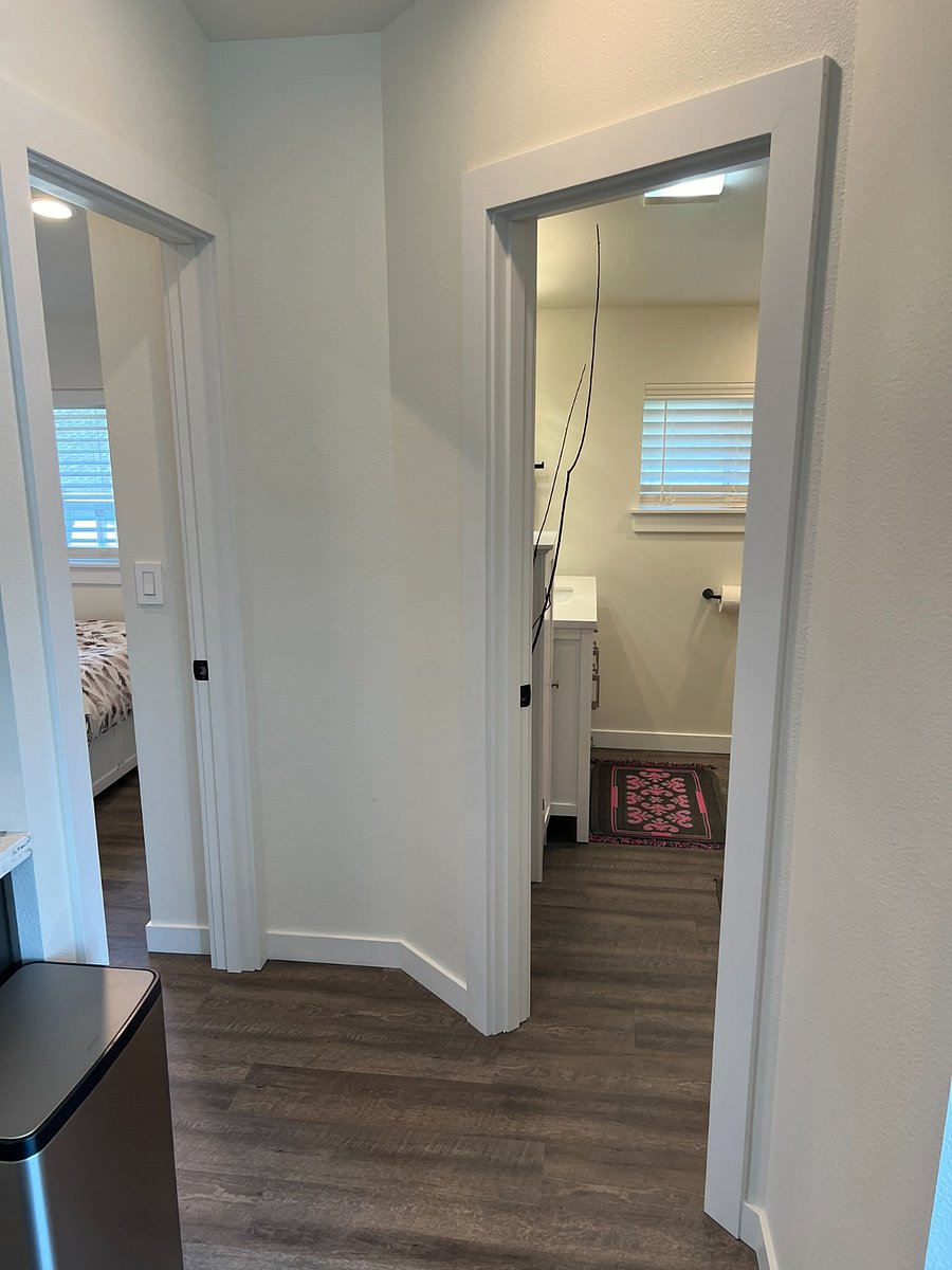 Second bedroom entrance on the left and bathroom entrance on the right