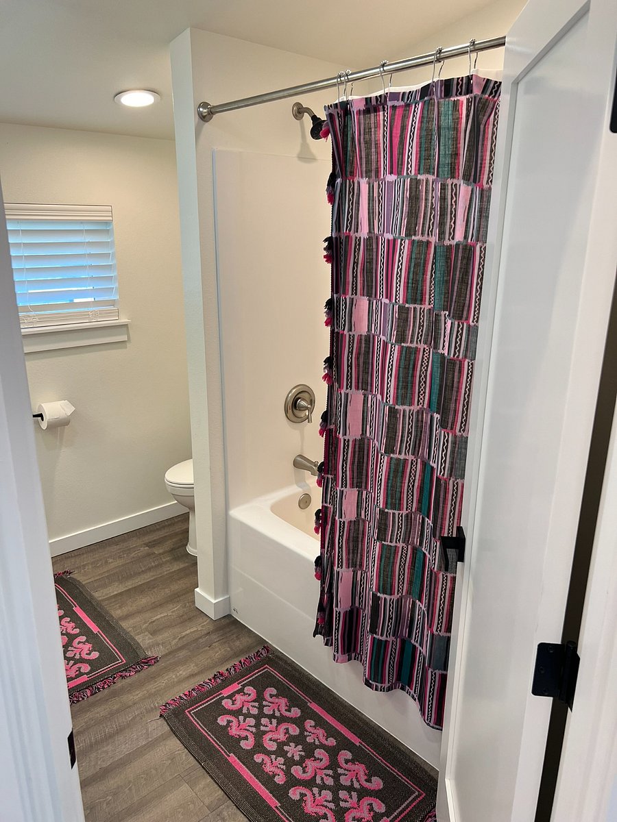 Standard tub/shower combo with elongated toilet and soft close seat