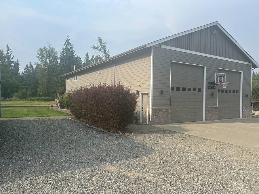 Gravel and paved parking available on north side of shop