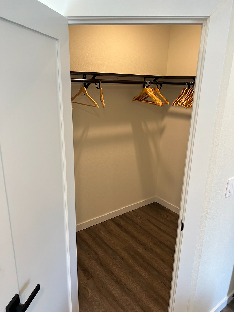 Walk in closet in primary bedroom