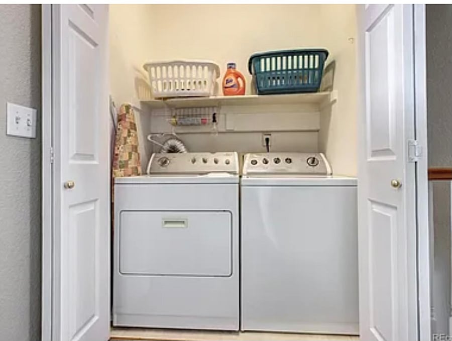 Washer & dryer upstairs by bedrooms