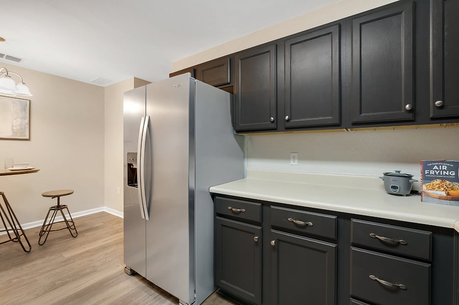 Store your groceries with ease in a spacious stainless steel fridge.